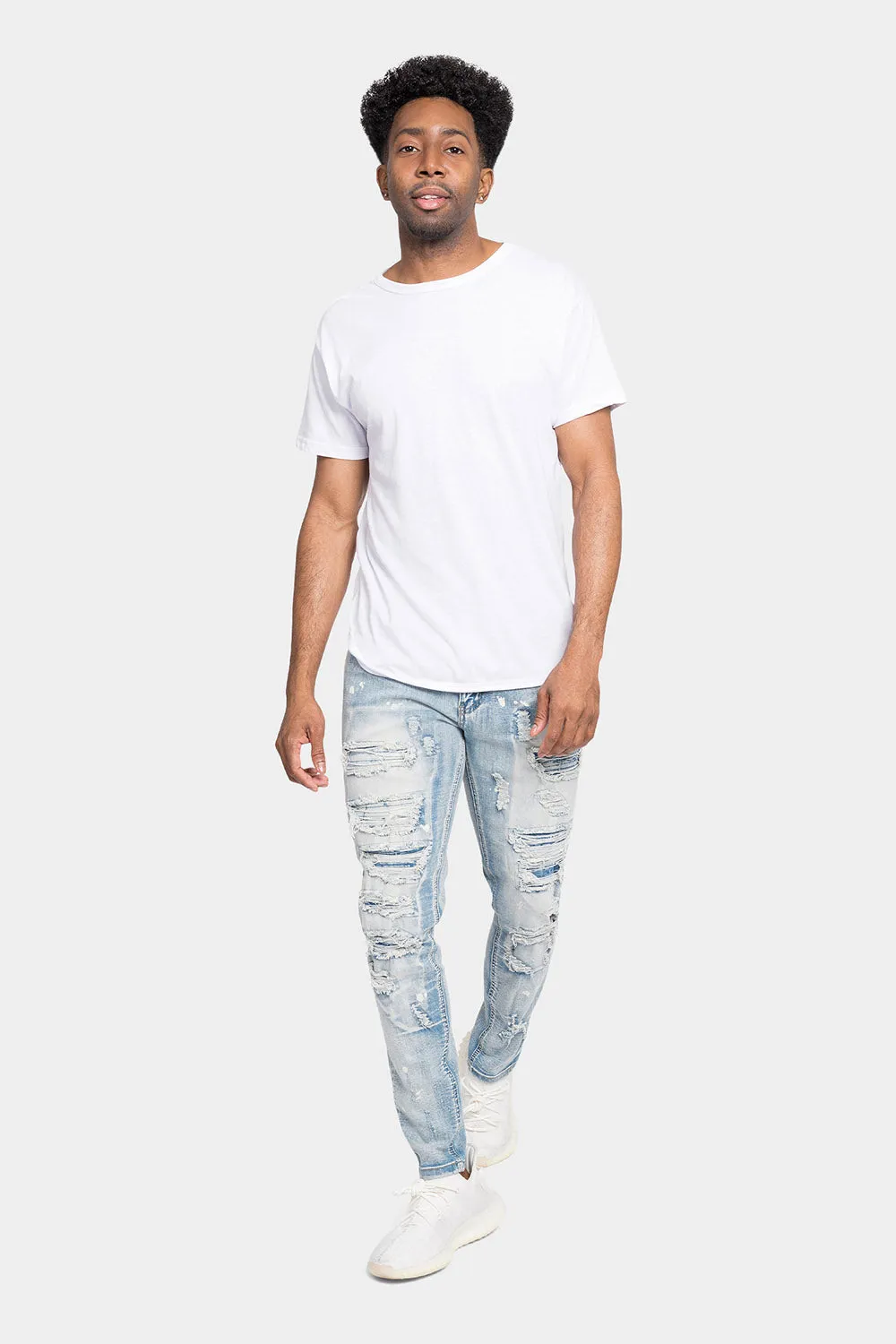 Distressed Patched Super Skinny Jeans