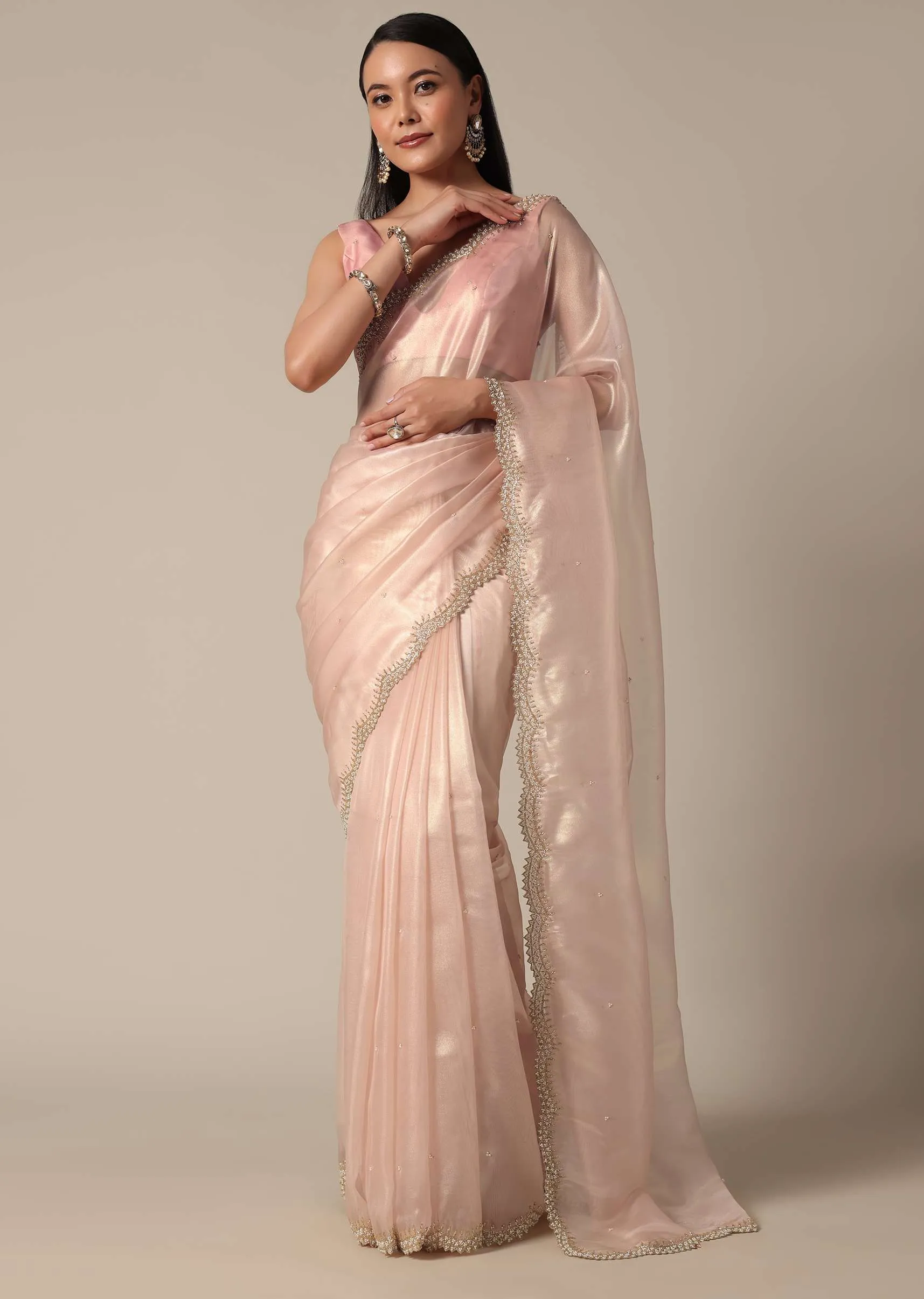 Elegant Peach Saree With Scalloped Border