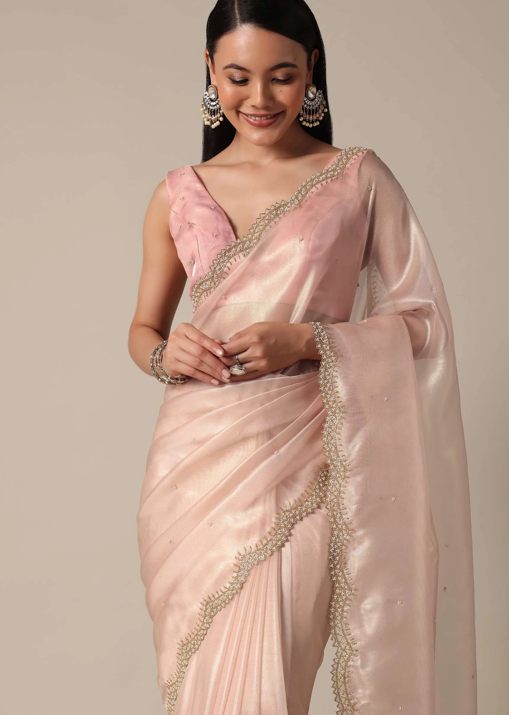 Elegant Peach Saree With Scalloped Border