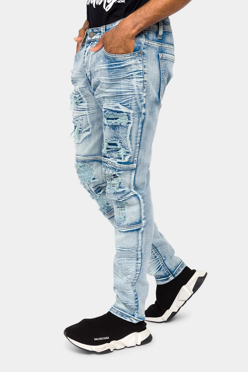 Faded Rip and Repair Denim Jeans
