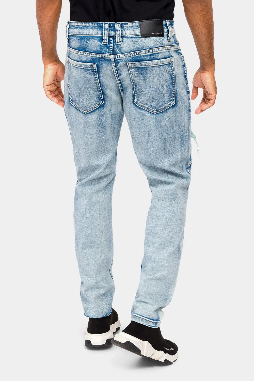 Faded Rip and Repair Denim Jeans