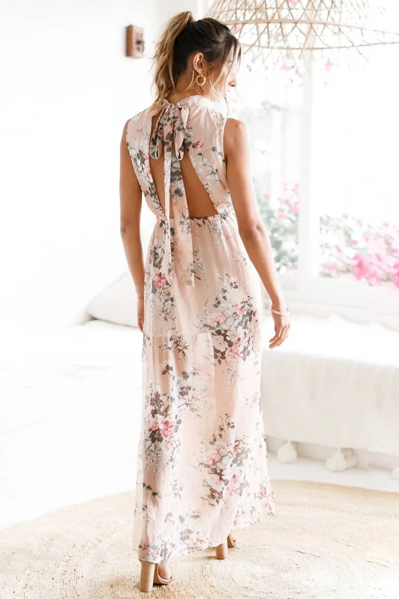 Long printed sleeveless dress with slits