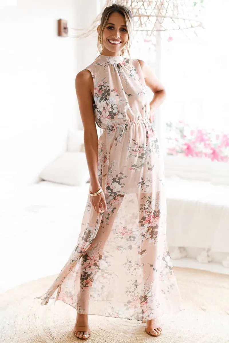 Long printed sleeveless dress with slits