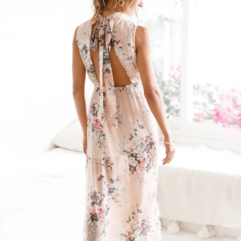 Long printed sleeveless dress with slits