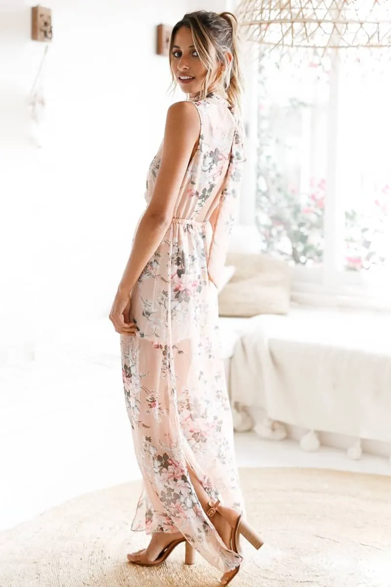 Long printed sleeveless dress with slits